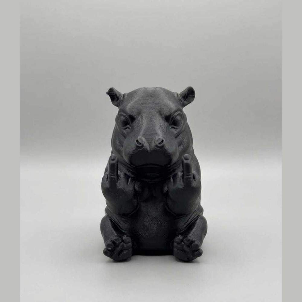 Hippopotamus 'With Personality' — Decorative Resin Figurine, Large, Round, and Full of Good Humor. Detailed, original-design hippopotamus figurine with a touch of irony that brings cheer wherever you place it. Sturdy decorative resin figurine.