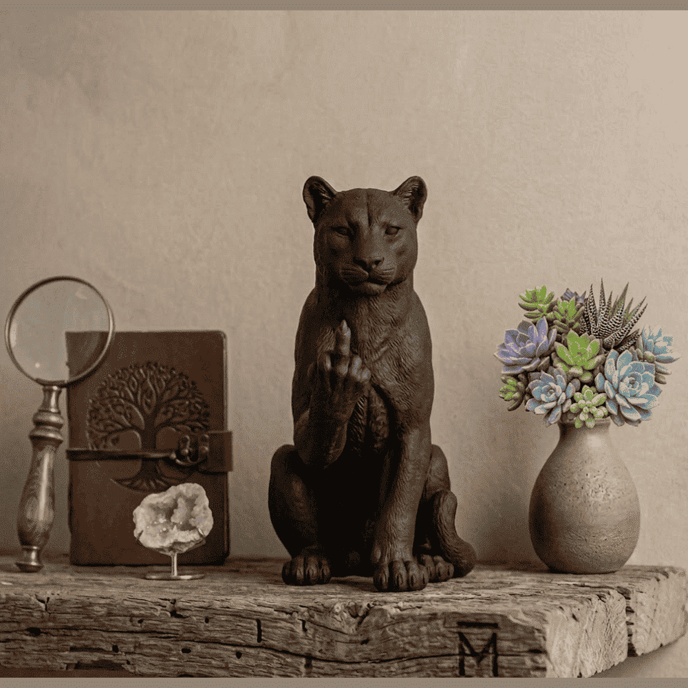 Panther 'The Rebel' — Matte Black Opaque Resin Statuette. Feline elegance and rebellious spirit, captured in the same pose. A large feline in a proud, relaxed pose, caught making an unabashedly provocative gesture. The Taraflo Taraflo Matte Black Resin Statuette