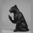 Panther "The Rebel" — Matte Black Resin Statue. Feline elegance and rebellious spirit, in one pose. A large feline in a proud, relaxed stance, caught making an unabashedly provocative gesture. Taraflo matte black resin statue