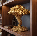Scultura dorata decorativa in resina a forma di tempesta astratta con finitura lucida