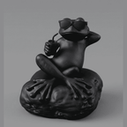 Statua rana relax nera opaca con occhiali da sole e bibita in mano, design moderno e divertente in resina per decorazione casa e ufficio