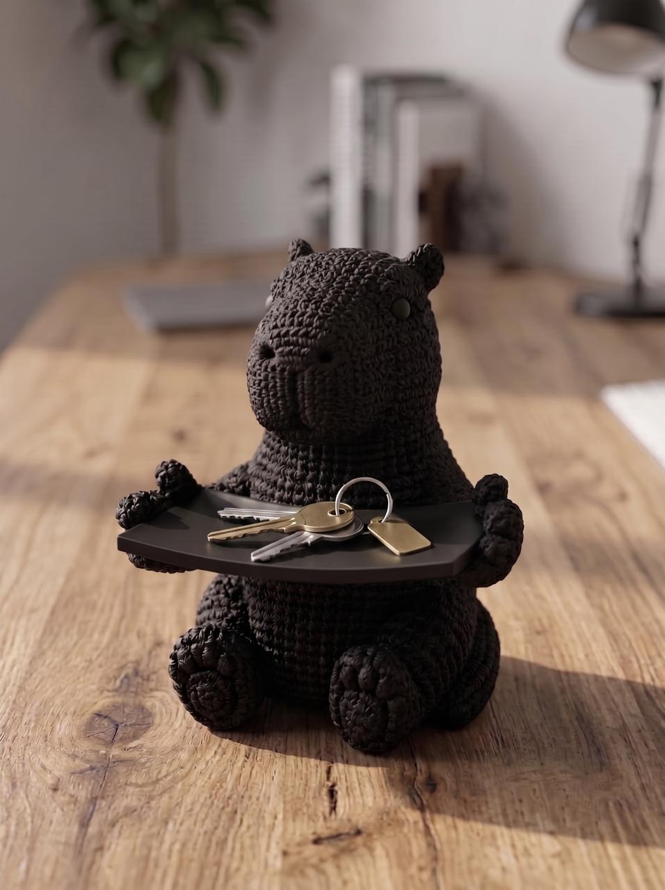 Svuotatasche lontra in resina nera opaca con effetto ricamato, portaoggetti da scrivania decorativo e funzionale handcrafted.