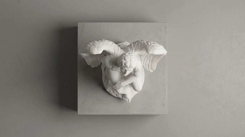 La Caduta di Icaro: Statua in Marmo Bianco sul Tragico Volo Mitologico - Taraflo