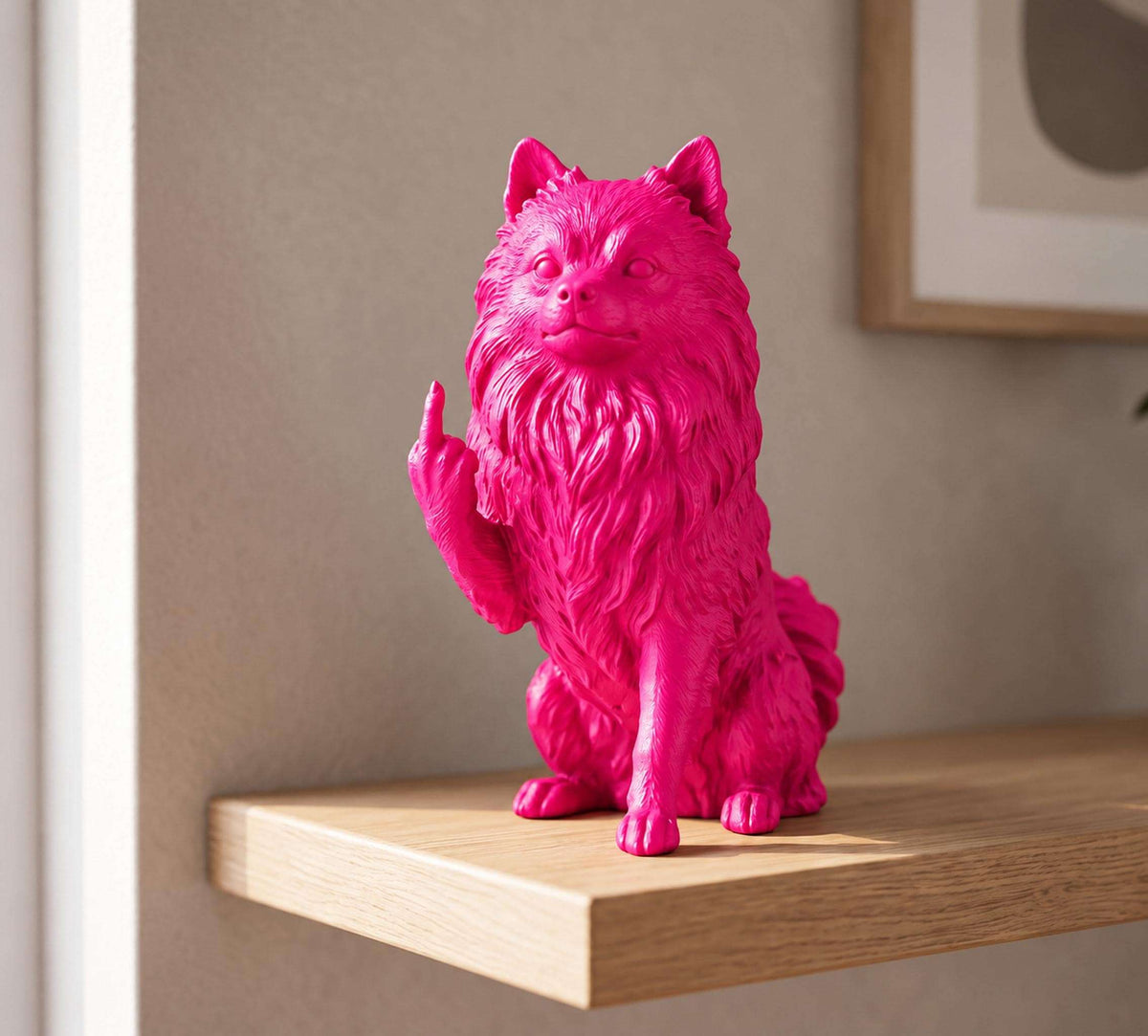 Statua Cane Volpino di Pomerania Rosa con Dito Medio